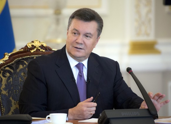Janukowitsch, hier in einer Aufnahme vom Dezember 2013, befindet sich in Russland.