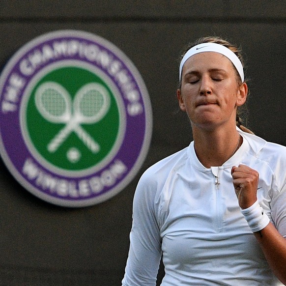 epa06064285 Victoria Azarenka of Belarus celebrates winning against Catherine Bellis of the USA during their first round match for the Wimbledon Championships at the All England Lawn Tennis Club, in L ...