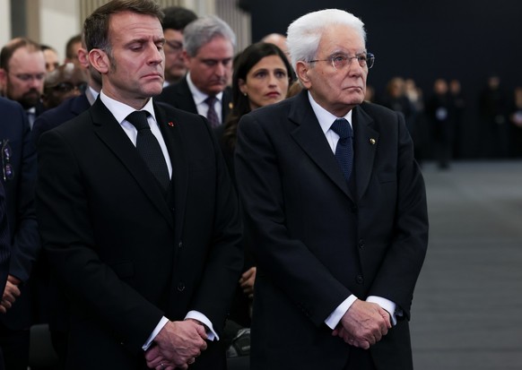 KEYPIX - Italy's President Sergio Mattarella and France's President Emmanuel Macron attend a national mourning ceremony for the victims of the deadly fire at "Le Constellation" bar ...