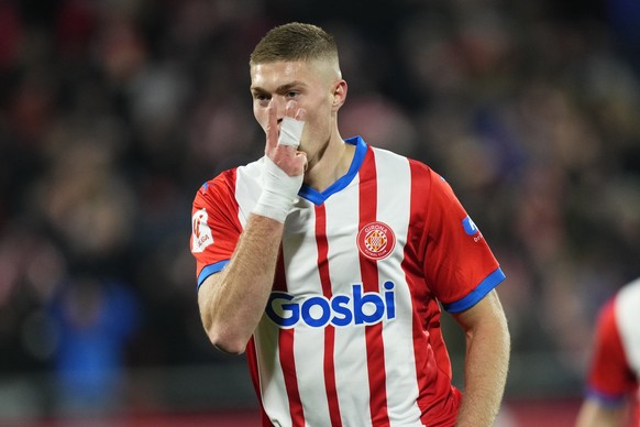 epa11095006 Girona&#039;s striker Artem Dovbyk jubilates after scoring his third goal, the 3-1 lead during the Spanish LaLiga soccer match between Girona FC and Sevilla FC at Montilivi stadium in Giro ...