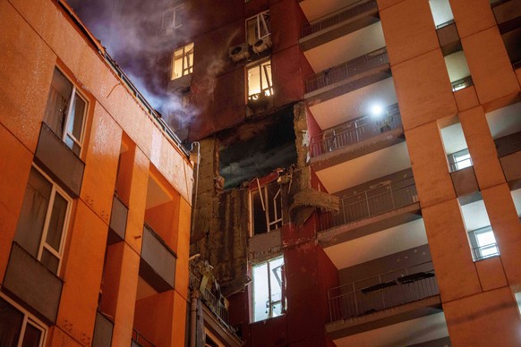 Smoke rises from a residential building damaged by a Russian strike on Kyiv, Ukraine, on Friday, Jan. 9, 2026. (AP Photo/Evgeniy Maloletka)
Russia Ukraine War