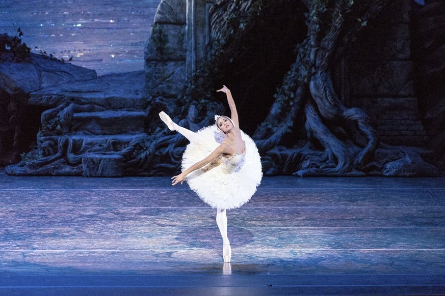 In this Sept. 3, 2014 photo released by ABT, Misty Copeland performs in &quot;Swan Lake,&quot; at the Queensland Performing Arts Centre in Queensland, Australia. Copeland danced the lead role of Odett ...