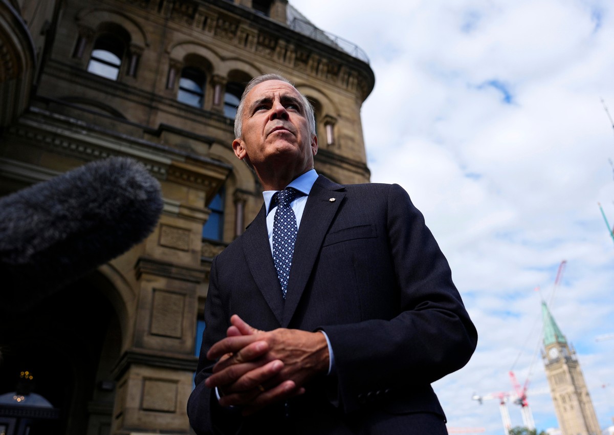 Canadian Prime Minister Mark Carney speaks with members of the media as he arrives at the Office of the Prime Minister and Privy Council in Ottawa, on Tuesday, Sept. 1, 2026. (Justin Tang/The Canadian ...
