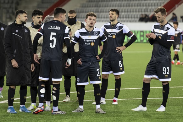 Lugano&#039;s Albian Hajdari, Lugano&#039;s Daniel Dos Santos, Lugano&#039;s Anto Grgic, Lugano&#039;s Kacper Przybylko, from 3. Left to right, react after the 2-2 draw, after the UEFA Conference Leag ...