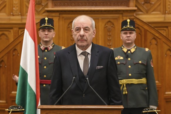 Newly elected Hungarian President Tamas Sulyok takes an oath during his inauguration ceremony at the plenary session of the Hungarian Parliament in Budapest, Hungary, Monday Feb. 26, 2024. Tamas Sulyo ...