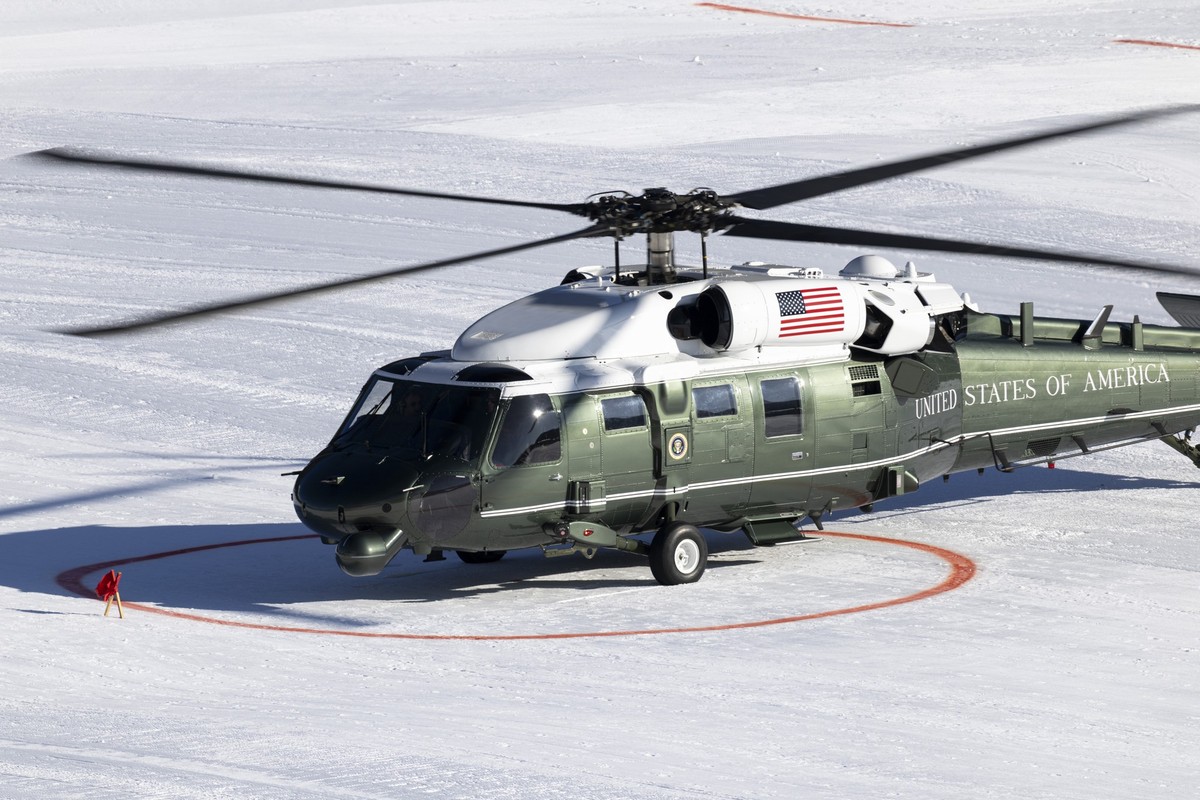The Marine One helicopter carrying US President Donald Trump lands on the sidelines of the 56th annual meeting of the World Economic Forum, WEF, in Davos, Switzerland, on Wednesday January 21, 2026. T ...