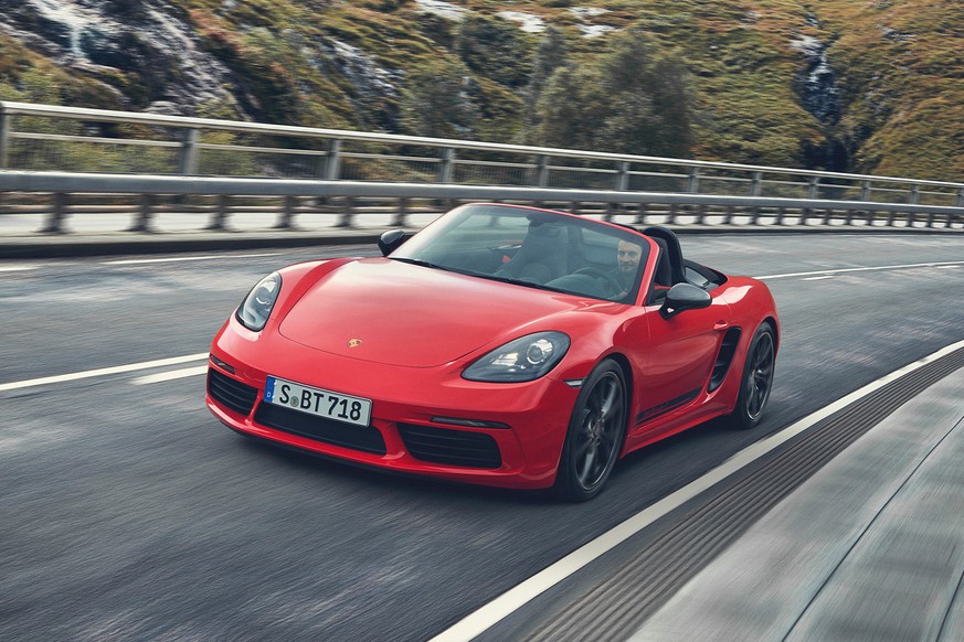 This undated photo provided by Porsche shows the 2019 Porsche 718 Boxster, one of the best sports cars on sale today. The mid-engine design gives it balanced handling around corners, while turbocharge ...