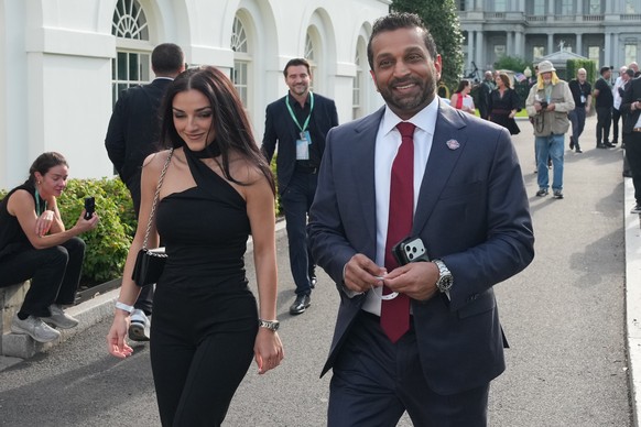 FBI director Kash Patel and Alexis Wilkins arrive at the White House ahead of the UFC Freedom 250 on the South Lawn, Sunday, June 14, 2026, in Washington. (AP Photo/Alex Brandon)
UFC Freedom 250 Trump