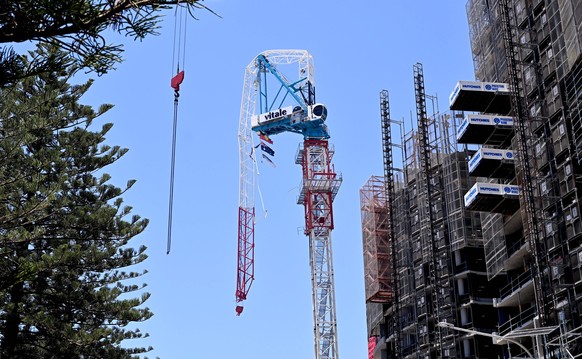 THUNDERSTORM GOLD COAST, A crane is seen at the Mondrian Towers development site in Burleigh Heads on the Gold Coast on Tuesday 26 December 2023.  A woman struck by a tree died after a storm...
