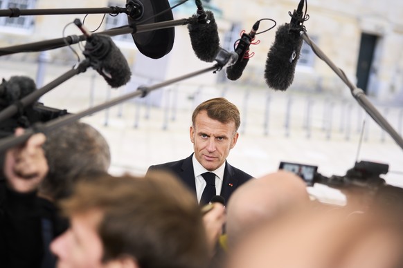 epa12420443 French President Emmanuel Macron arrives at an informal summit in the Danish Parliament at Christiansborg Castle in Copenhagen on Wednesday, October 1, 2025. Denmark is hosting an informal ...
