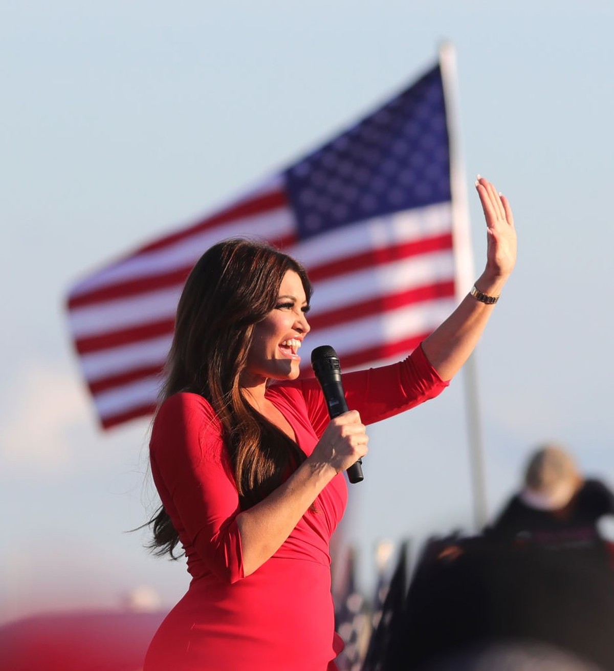 Kimberly Guilfoyle, the girlfriend of Donald Trump, Jr., responds to supporters before President Donald Trump's arrival at a campaign rally at Orlando-Sanford International Airport in on Monday,  ...