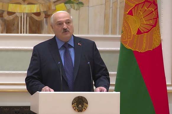 This handout photo taken from video released Tuesday, June 27, 2023 by Belarus&#039; Presidential Press Office, shows Belarusian President Alexander Lukashenko delivering his speech during a ceremony  ...