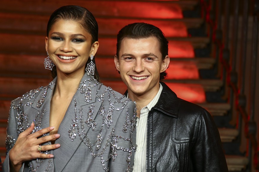 Tom Holland, right, and Zendaya pose for photographers at the photo call for the film &#039;Spider-Man: No Way Home&#039; in London Sunday, Dec. 5, 2021. (Photo by Joel C Ryan/Invision/AP)
Tom Holland ...