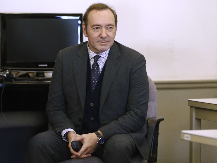 Actor Kevin Spacey sits in district court during arraignment on a charge of indecent assault and battery on Monday, Jan. 7, 2019, in Nantucket, Mass. The Oscar-winning actor is accused of groping the  ...