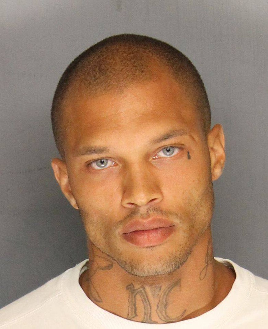 This Wednesday, June 18, 2014, booking photo released by the Stockton Police Department shows Jeremy Meeks, 30, who was arrested Wednesday on felony weapons charges in Stockton, Calif. By late Thursda ...