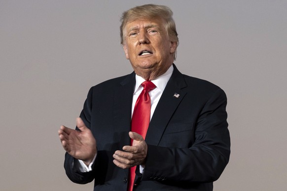 FILE - In this Sept. 25, 2021, file photo, former President Donald Trump prepares to take the stage during his Save America rally in Perry, Ga. Supporters of Republican Georgia Gov. Brian Kemp are fig ...