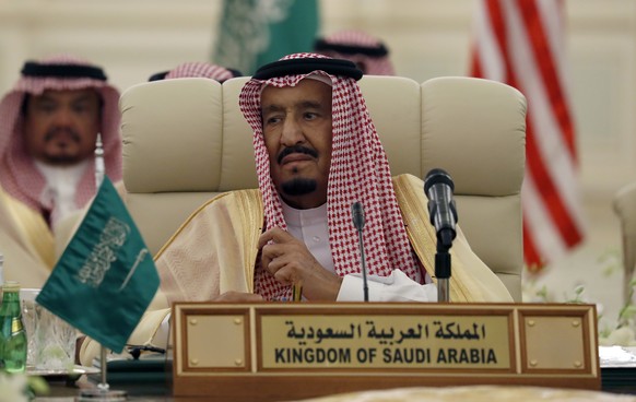 Saudi King Salman listens during a meeting of the Saudi-Iraqi Bilateral Coordination Council with Secretary of State Rex Tillerson and Iraqi Prime Minister Haider al-Abadi, Sunday, Oct. 22, 2017, in R ...