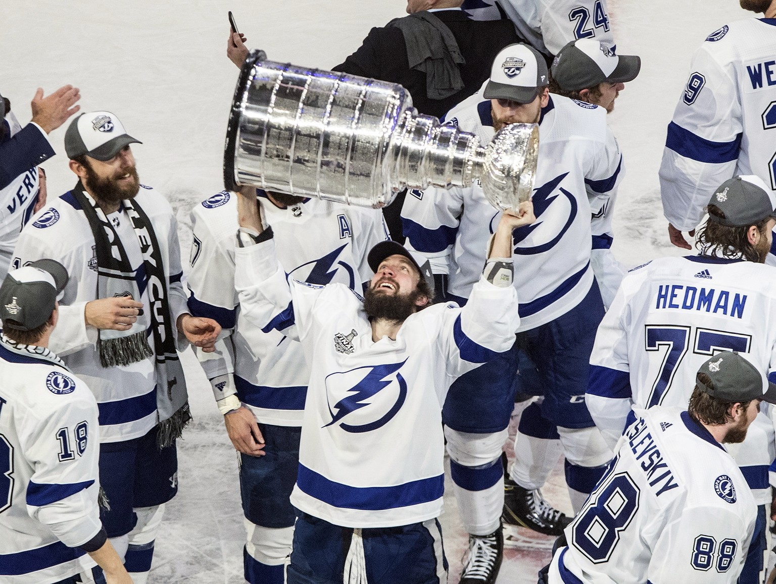 FILE - In this Sept. 28, 2020, file photo, Tampa Bay Lightning&#039;s Nikita Kucherov (86) hoists the Stanley Cup after defeating the Dallas Stars in the NHL Stanley Cup hockey finals in Edmonton, Alb ...