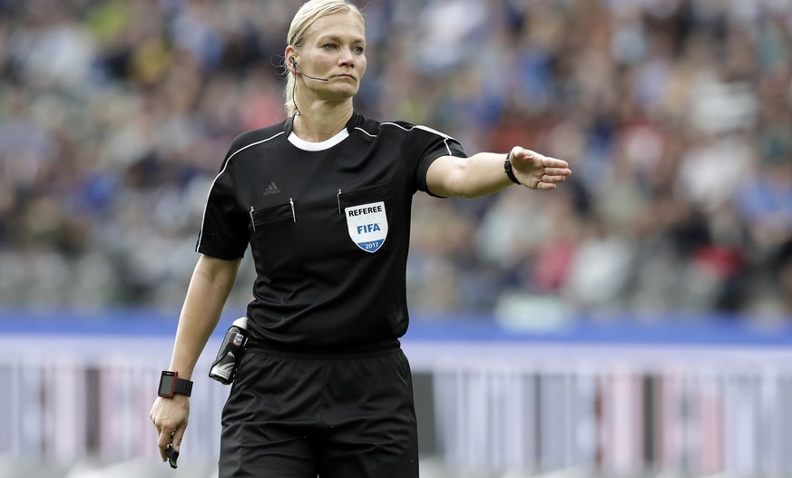 FILE - In this Sept. 10, 2017 file photo, Referee Bibiana Steinhaus points during the German Bundesliga soccer match between Hertha BSC Berlin and SV Werder Bremen in Berlin, Germany. Bibiana Steinhau ...