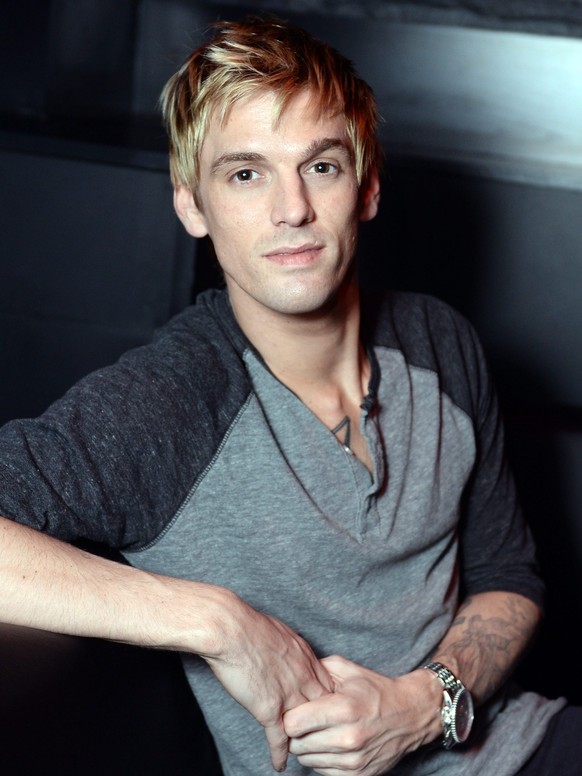 epa04574208 US pop singer Aaron Carter poses for pictures during an interview at K17 prior to a concert in Berlin, Germany, 21 January 2015. Carter starts a comeback tour in Germany on this month. EPA ...