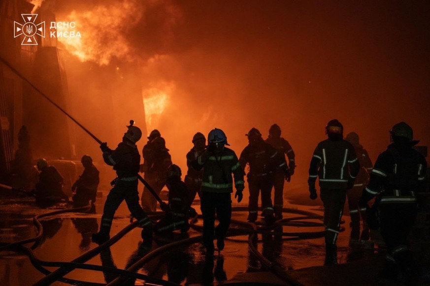 In this photo provided by the Ukrainian Emergency Service, firefighters put out a fire following a Russian drone attack in Kyiv, Dnipropetrovsk region, Ukraine, Friday, Sept. 11, 2026. (Ukrainian Emer ...