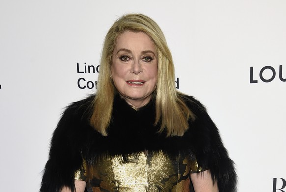 FILE- In this Nov. 30, 2017, file photo, Catherine Deneuve attends the Lincoln Center Corporate Fund Gala honoring Louis Vuitton artistic director of women&#039;s collections Nicolas Ghesquiere, at Al ...