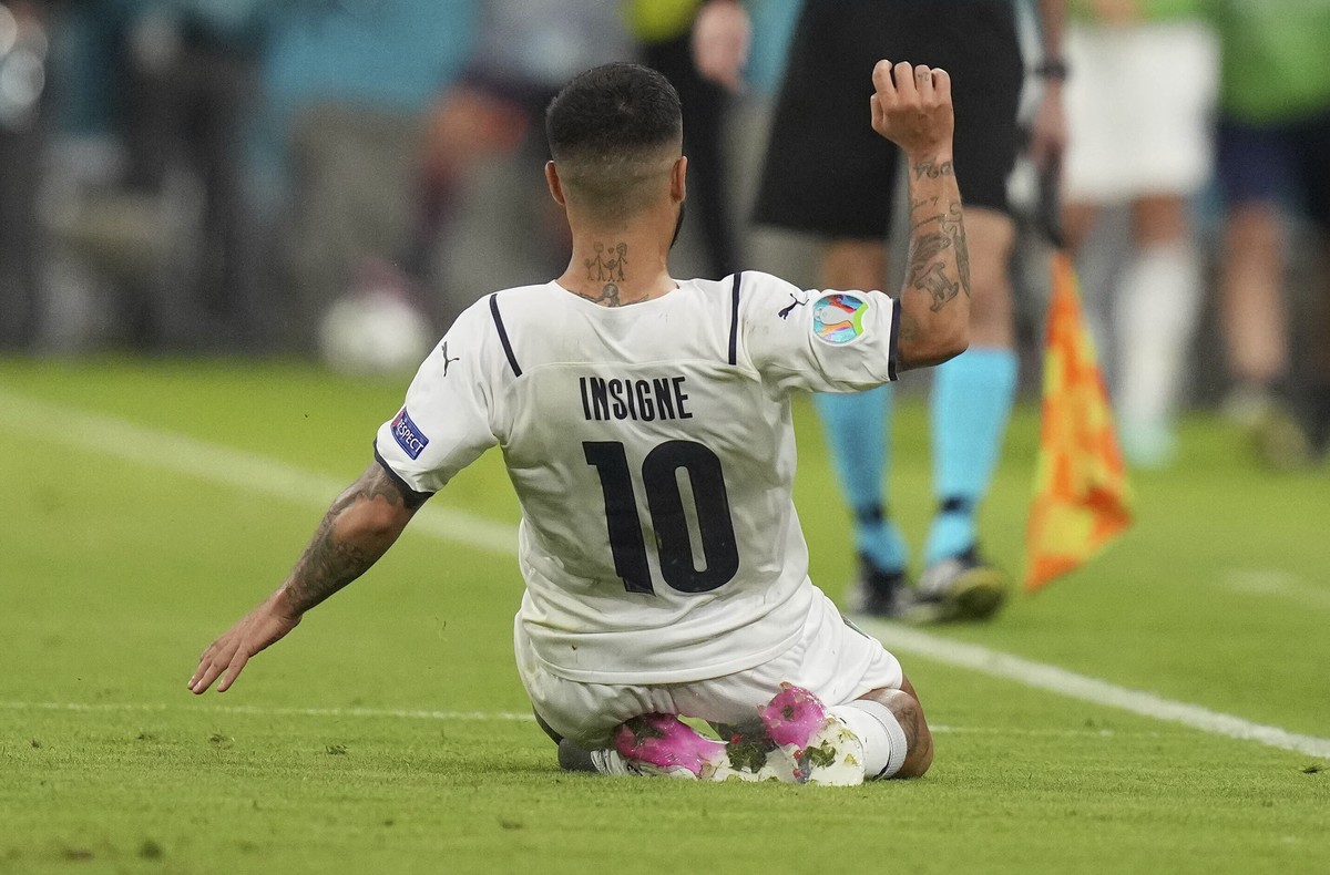 Italy's Lorenzo Insigne celebrates scoring his side's second goal during the Euro 2020 soccer championship quarterfinal match between Belgium and Italy at the Allianz Arena stadium in Munich ...
