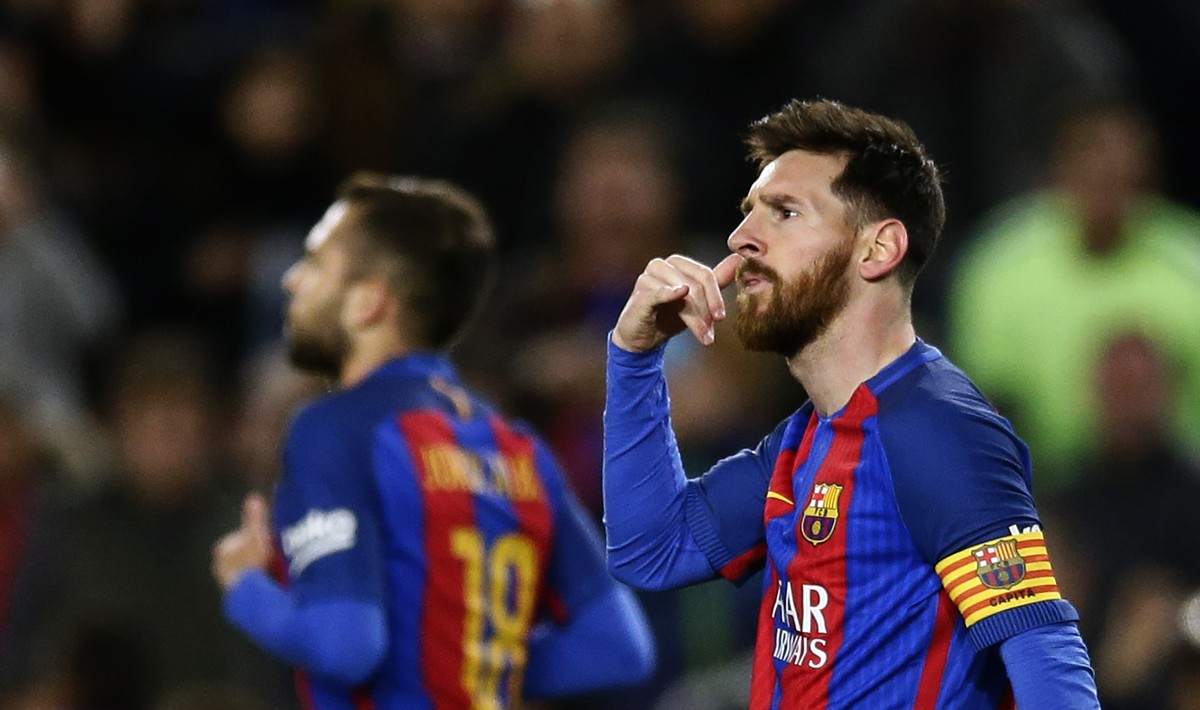 FC Barcelona's Lionel Messi gestures after scoring during the Spanish La Liga soccer match between FC Barcelona and Celta Vigo at the Camp Nou in Barcelona, Spain, Saturday, March 4, 2017. (AP Ph ...