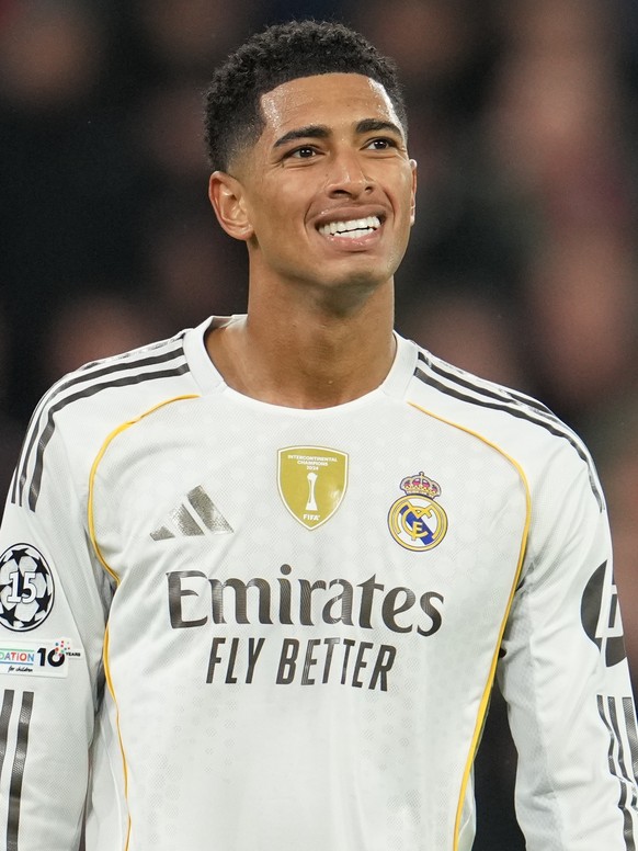 Real Madrid&#039;s Jude Bellingham reacts after receiving a yellow card during the Champions League soccer match between Liverpool and Real Madrid in Liverpool, England, Tuesday, Nov. 4, 2025. (AP Pho ...