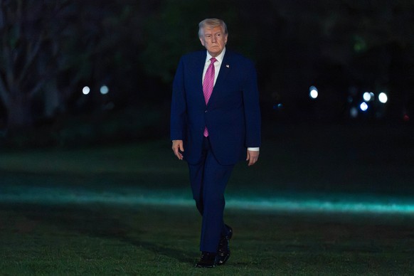 President Donald Trump walks on the South Lawn upon his arrival to the White House, Friday, April 10, 2026, in Washington. (AP Photo/Jose Luis Magana)
Donald Trump