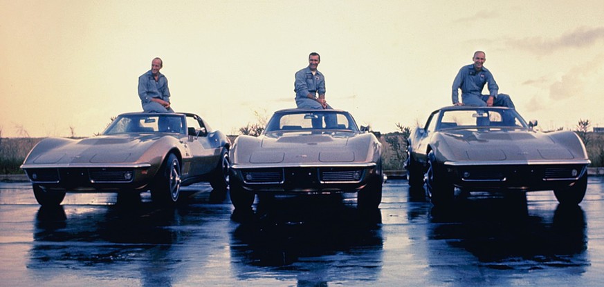 The Apollo 12 crew and their Corvettes. 1969.