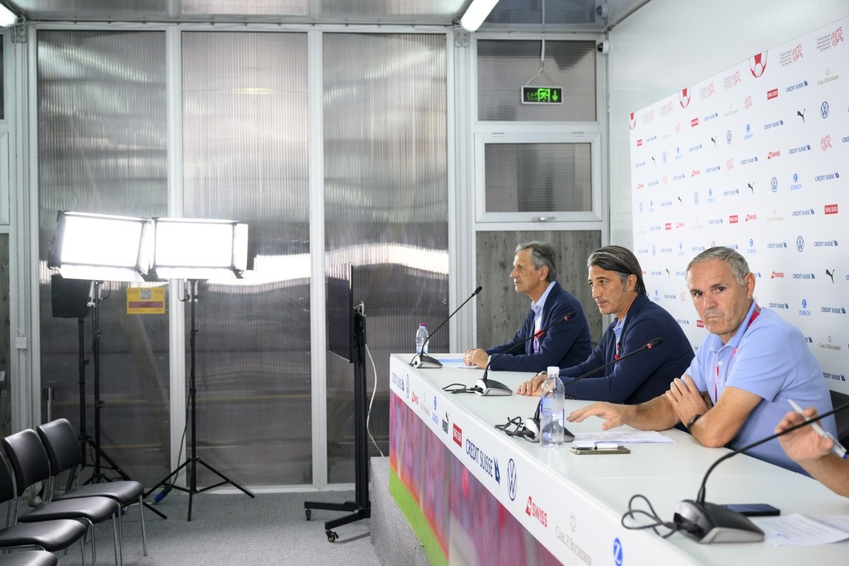 From left, Switzerland's soccer federation president Dominique Blanc, Switzerland's head coach Murat Yakin, and Switzerland's national soccer teams director Pierluigi Tami speak during  ...