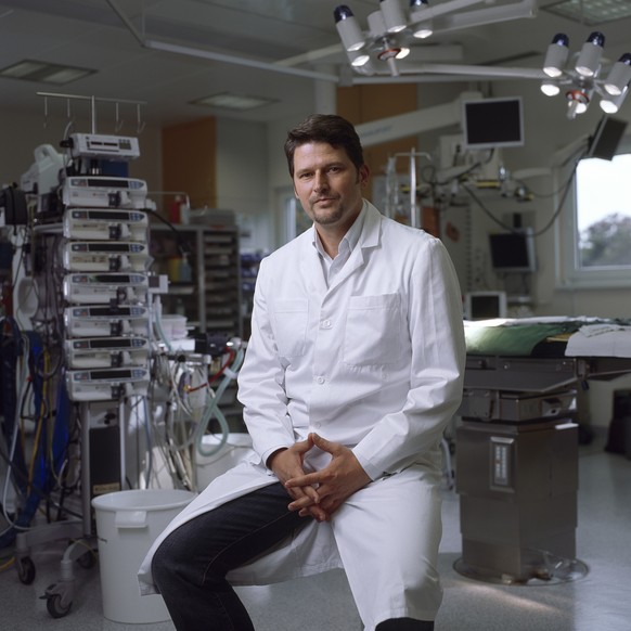 A portrait of Michael Huebler, head physician of the cardiac surgery ward at the University Children&#039;s Hospital in Zurich, Switzerland. The picture is taken in one of the operating rooms at the c ...
