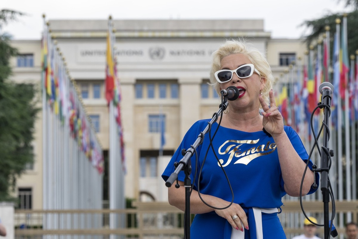 Women's rights activist "Posie Parker" (real name Kellie-Jay Keen), during a Let Women Speak rally on the place des Nations in front of the European headquarters of the United Nations,  ...