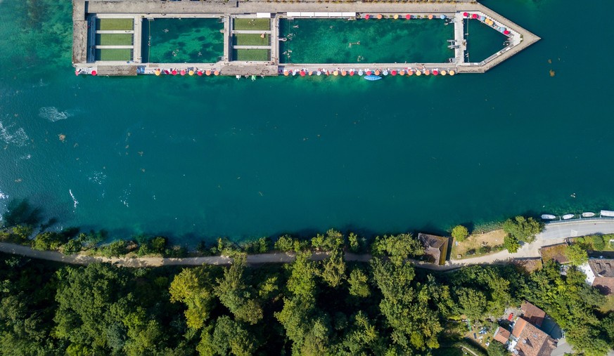 Drone image of the public swimming pool in the nature water on the Rhine river by the old Swiss town Schaffhausen, Switzerland