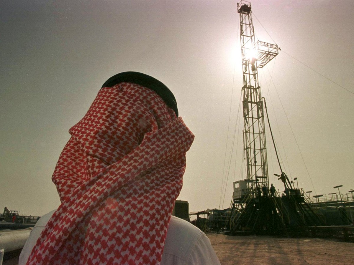 Khaled al Otaiby, an official of the Saudi oil company Aramco watches progress at a rig at the al-Howta oil field near Howta, Saudi Arabia, on Feb. 26, 1997. Oil prices surged close to dollar42 a barr ...
