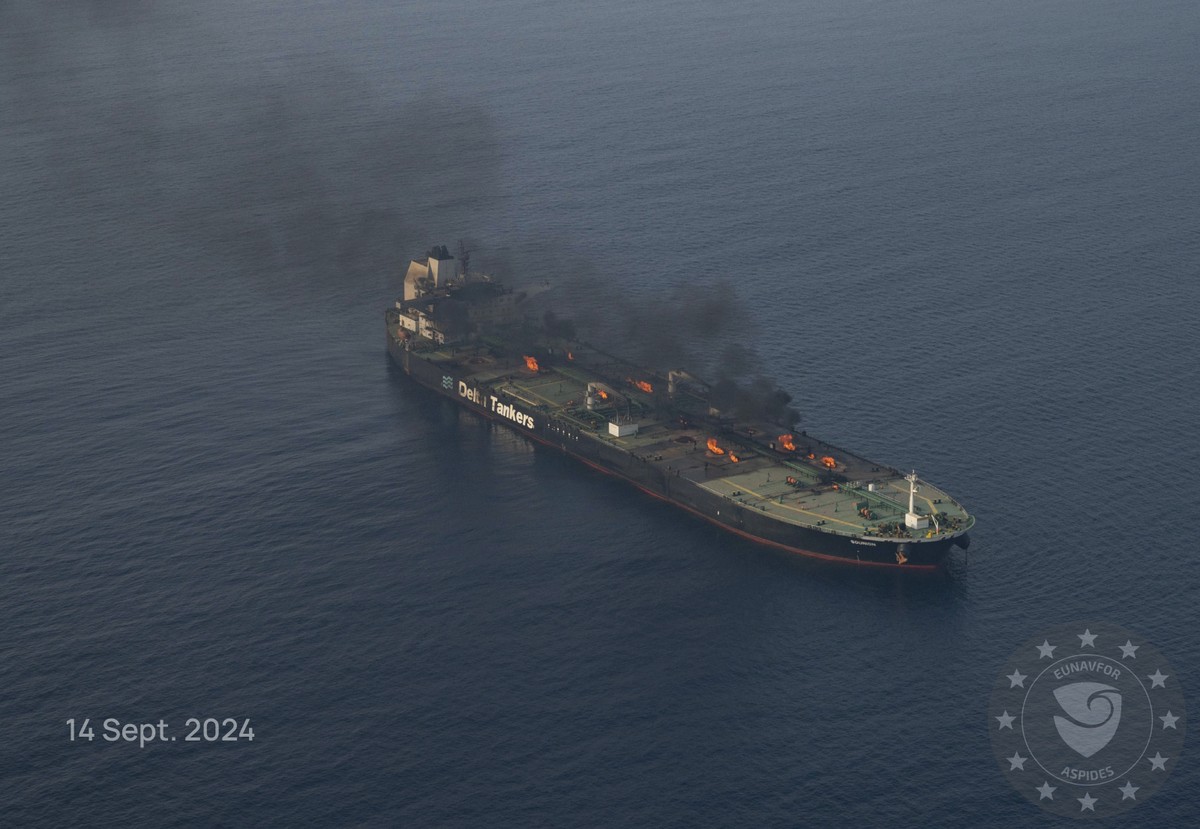 This photo released by the European Union's Operation Aspides naval force shows the oil tanker Sounion burning in the Red Sea following a series of attacks by Yemen's Houthi rebels, on Satur ...
