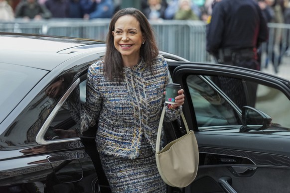 epa12586974 Nobel Peace Prize laureate Maria Corina Machado arrives at the Grand Hotel after her audience at the Palace in Oslo, Norway, 12 December 2025. She received the Nobel Peace Prize 2025 for h ...