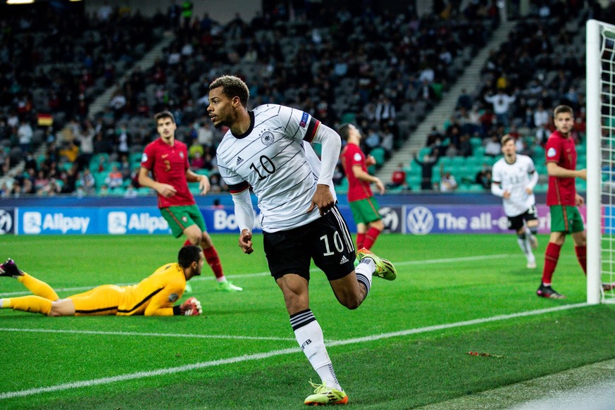 LJUBLJANA, SLOVENIA - JUNE 06: Lukas Nmecha of Germany celebrates after scoring their side s first goal during the 2021 UEFA European Under-21 Championship Final match between Germany and Portugal at  ...