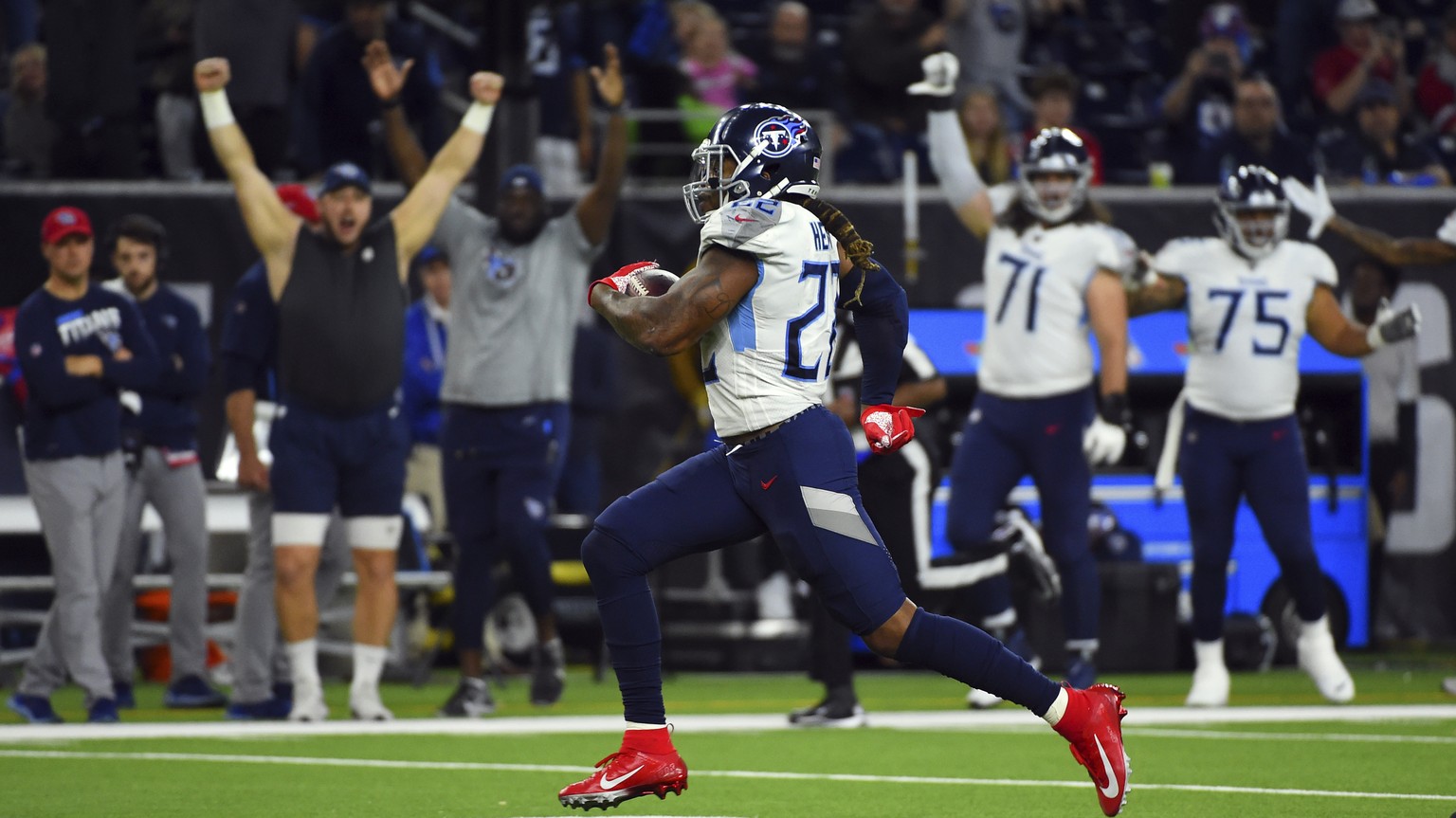 Tennessee Titans running back Derrick Henry (22) rushes for a 53-yard touchdown against the Houston Texans during the second half of an NFL football game Sunday, Dec. 29, 2019, in Houston. Henry&#039; ...