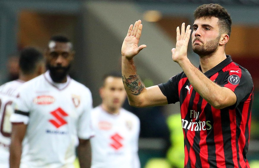 epa07220567 Milan&#039;s Patrick Cutrone (R) reacts during the Italian Serie A soccer match between AC Milan and Torino FC at Giuseppe Meazza stadium in Milan, Italy, 09 December 2018. EPA/MATTEO BAZZ ...