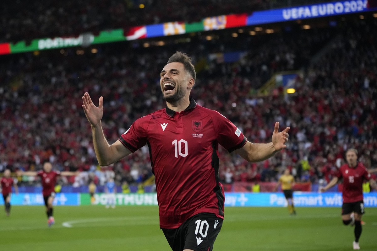 Albania's Nedim Bajrami celebrates after scoring his side's opening goal during a Group B match between Italy and Albania at the Euro 2024 soccer tournament in Dortmund, Germany, Saturday, J ...