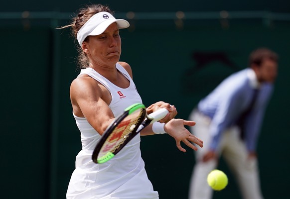 epa07703077 Barbora Strycova of the Czech Republic returns to Elise Mertens of Belgium in their fourth round match during the Wimbledon Championships at the All England Lawn Tennis Club, in London, Br ...