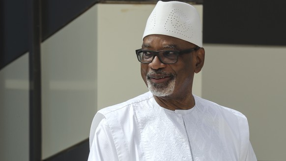 FILE - In this Tuesday, June 30, 2020 file photo, Mali&#039;s President Ibrahim Boubacar Keita poses for a group photograph during the G5 Sahel summit in Nouakchott, Mauritania. Mutinous soldiers surr ...