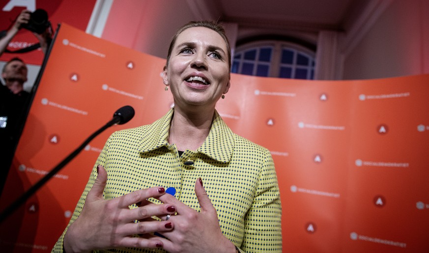 epa07628871 Opposition leader Mette Frederiksen of The Danish Social Democrats addresses her supporters after the election results are released during the Parliamentary Elections at Christiansborg Cas ...