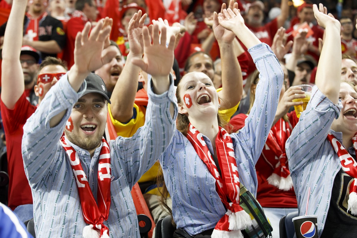 Switzerland's supporters cheer their team, during the IIHF 2018 World Championship preliminary round game between Slovakia and Switzerland, at the Royal Arena, in Copenhagen, Denmark, Sunday, May ...