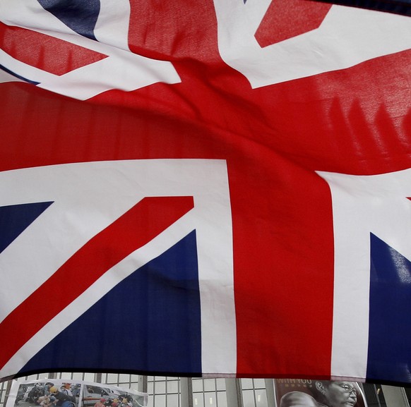British flags flutter next to protest placards placed by protesters outside the Central Government Office building in Hong Kong on Thursday, July 4, 2019. A Hong Kong pro-democracy lawmaker expressed ...