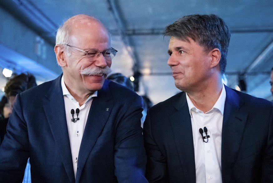 Daimler-Chef Dieter Zetsche und BMW-CEO Harald Krüger wollen gemeinsam selbstfahrende Autos entwickeln.