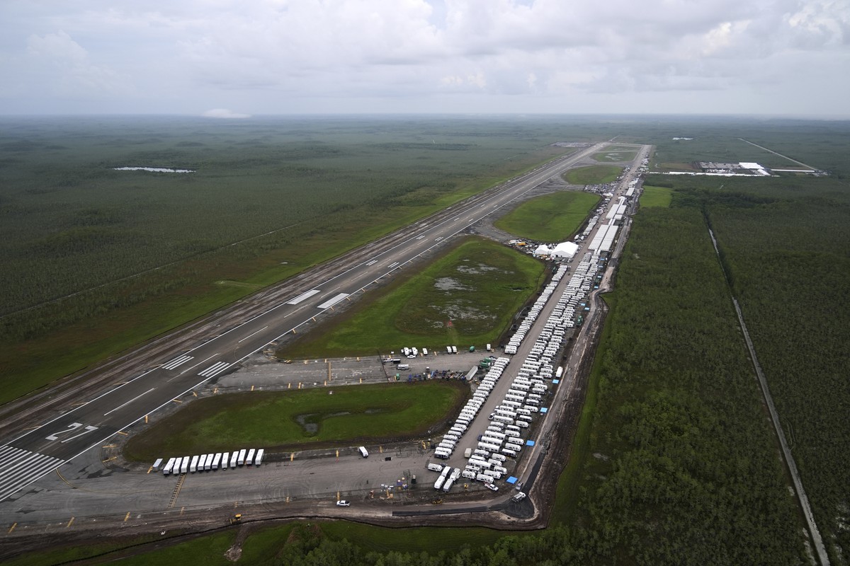 Work progresses on a new migrant detention facility dubbed "Alligator Alcatraz," at Dade-Collier Training and Transition facility in the Florida Everglades, Friday, July 4, 2025, in Ochopee, ...