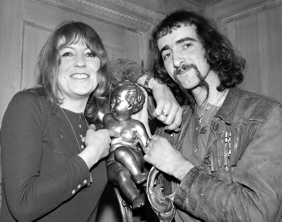 FILE - Bass guitarist John McVie, of the Fleetwood Mac pop group, right, and Christine Perfect of the Chicken Shack Group appear at a party for Fleetwood Mac, in London, on Feb. 20, 1969. Christine Mc ...